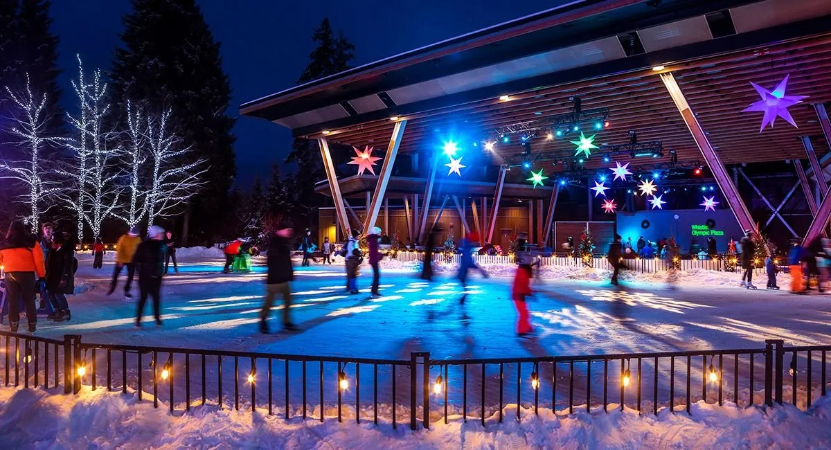 Ice skating under lights at night